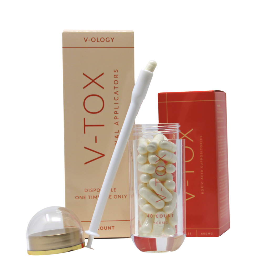 A bottle of V-OLOGY's V-Tox Boric Acid Kit is next to a box.