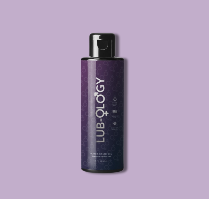 A bottle of V-OLOGY Vitality Silicone Dilator Bundle on a purple background.