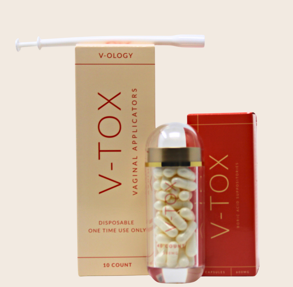 A box of V-OLOGY's V-Tox Boric Acid Kit and a toothbrush next to it.