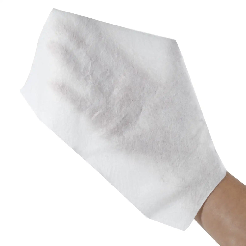 A hand holding a V-Wipes paper towel on a white background.